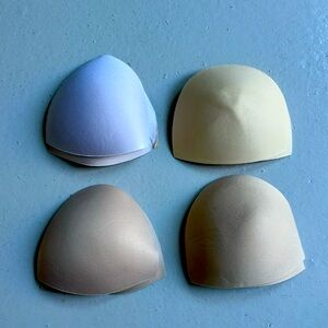 Pads for bathing suit tops. OS. Four sets